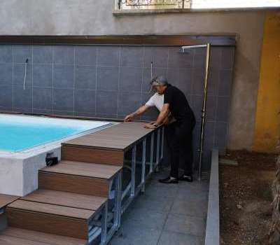 Costruzione su misura di copertura piscina decking da esterno